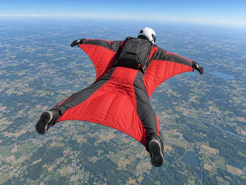 Ilustración generada por IA: Vuelo con wingsuit